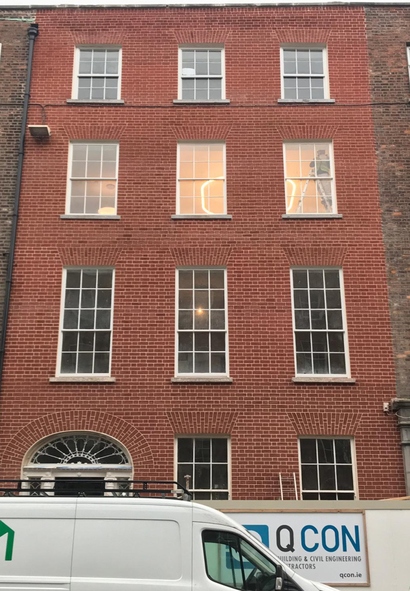 Georgian brick facade in Limerick, Ireland after re-pointing and restoration